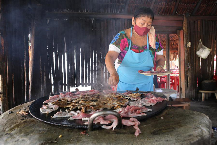 Women cooking Poc Chuch in Tikuch Yucatan